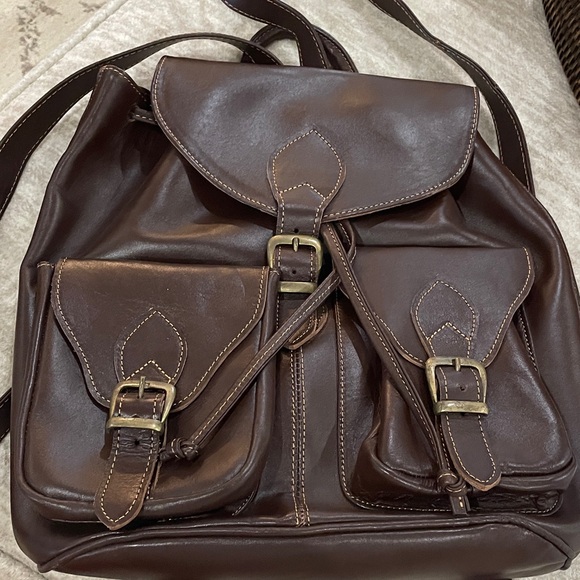 dark brown leather backpack womens Women's need items like your phone or keys 2 Outer Pockets 1 Side Pocket 100% made in the USA Materials Best Vintage Rivet Brown Leather